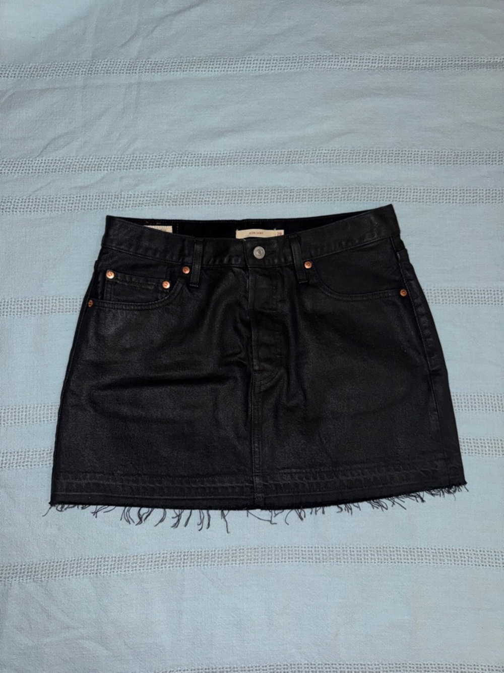 Levi's Black Coated Denim Mini Skirt with Frayed Hem